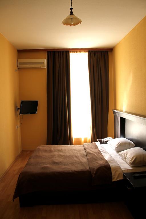 Avenue Hotel Tiflis Habitación foto